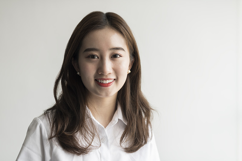 微笑的年輕中國女商業主管圖片素材