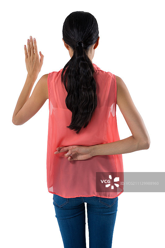 女人在白色背景下打手势的后视图图片素材