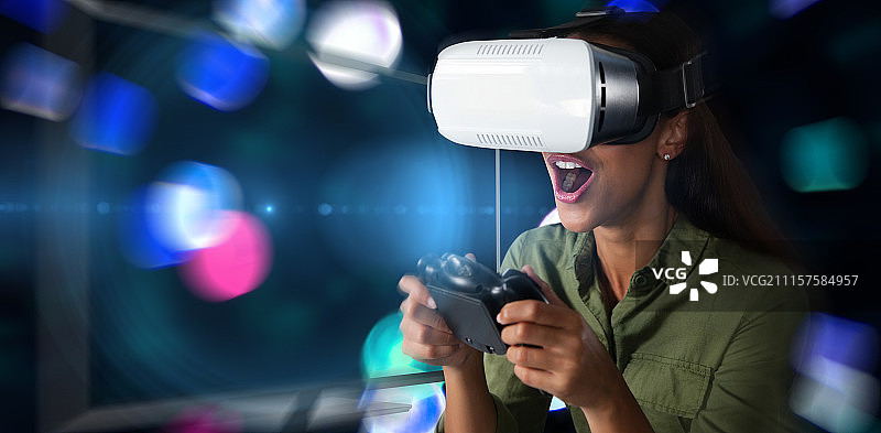女子用虚拟现实耳机玩电子游戏的合成图像图片素材