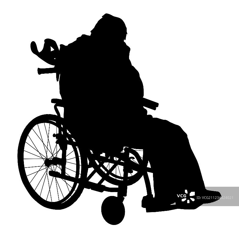 一个坐轮椅的残疾人的剪影图片素材