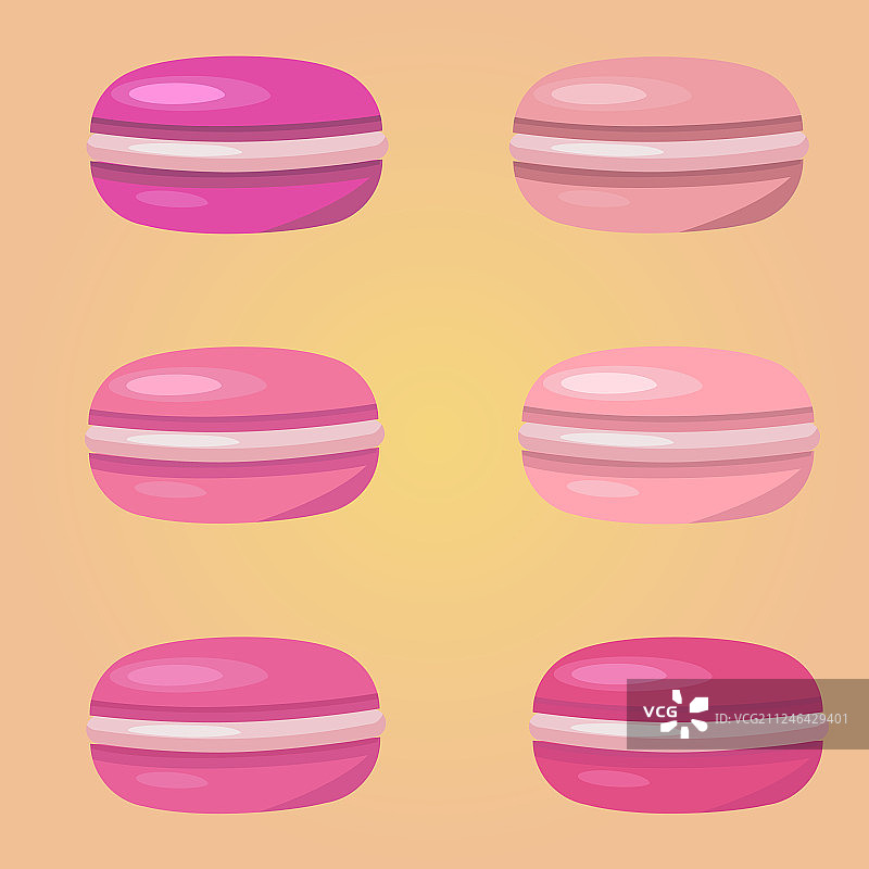 粉红色背景上的彩色水彩蛋白杏仁饼干图片素材