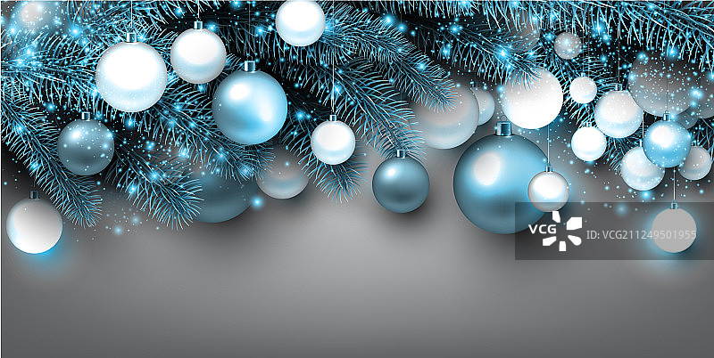 蓝色的圣诞背景与冷杉树枝和球图片素材