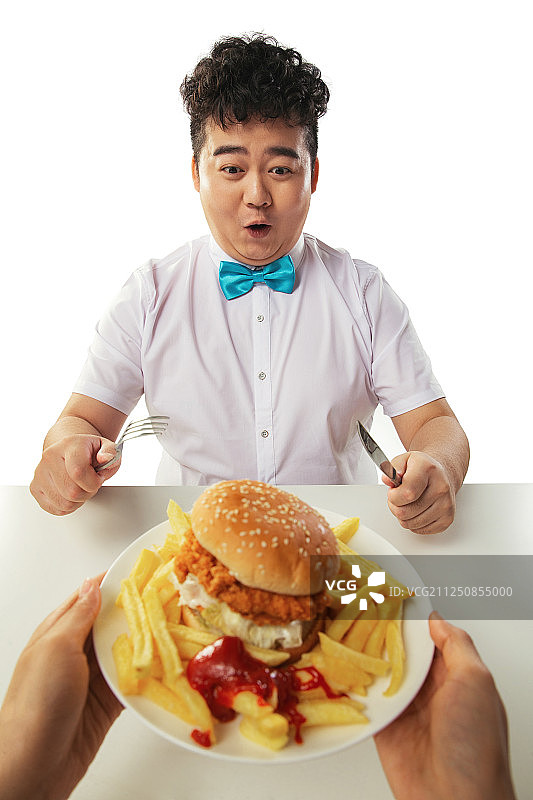 小胖子吃汉堡包图片素材
