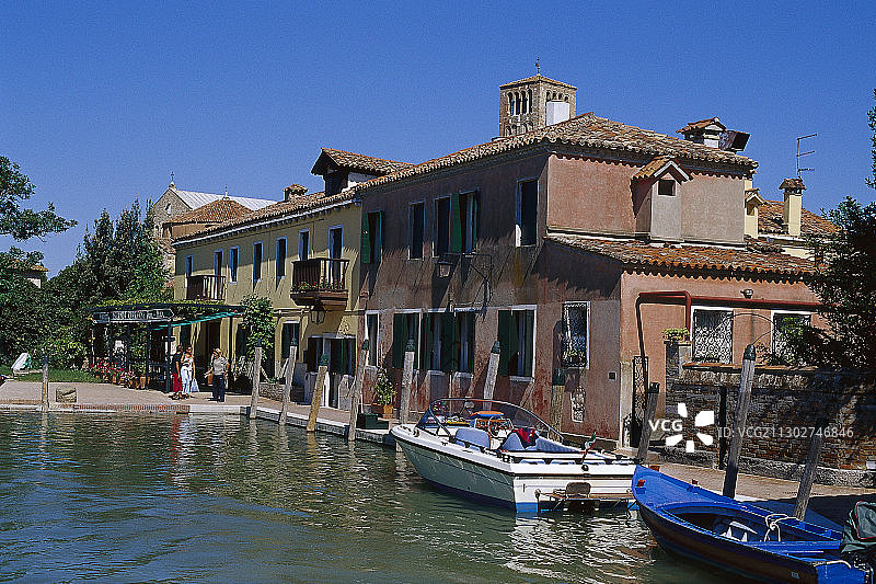 西普里亚尼餐厅在运河在阳光下，托切洛，威尼斯，意大利，欧洲图片素材