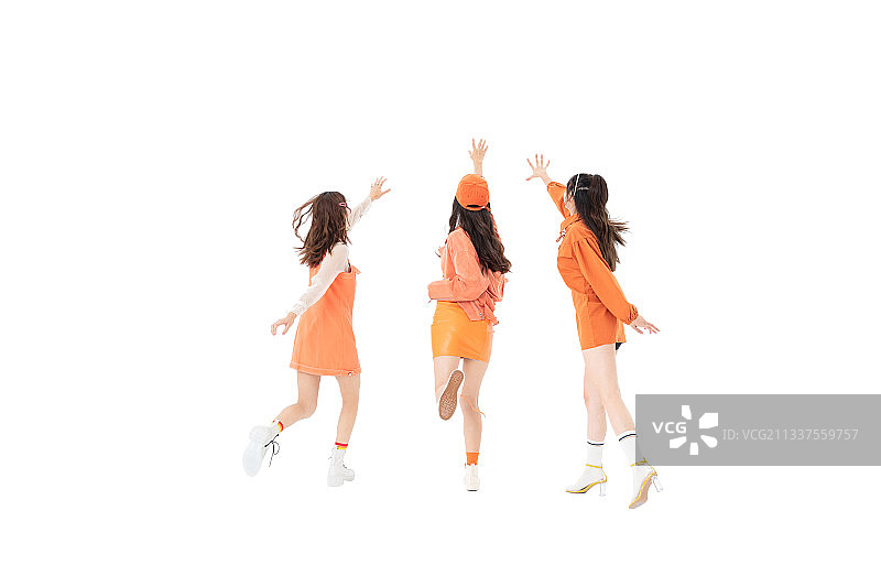 跳跃与奔跑的三个年轻女孩图片素材