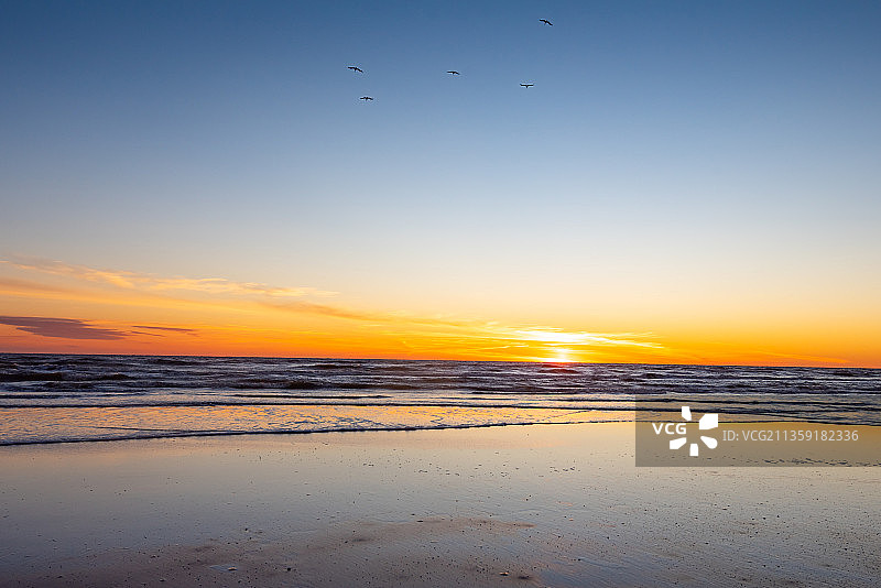 日落时的海天景色，加尔维斯顿，德克萨斯州，美国图片素材