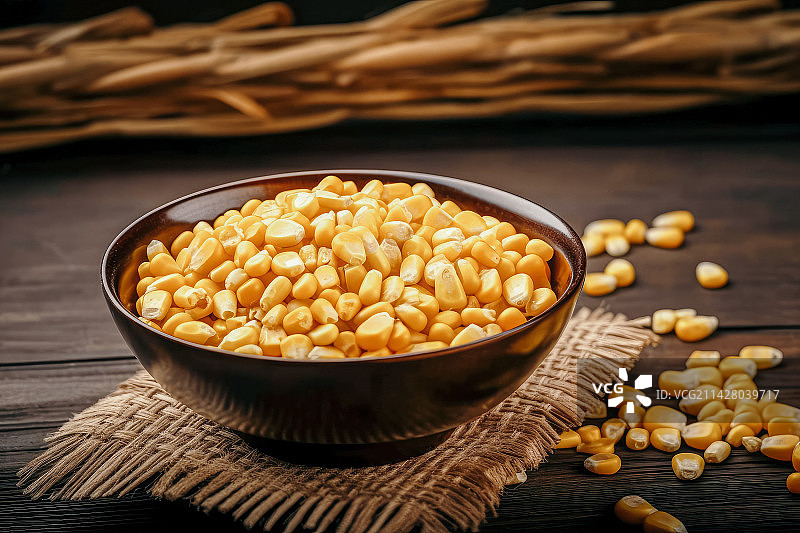 碗中盛放的大量金色玉米粒，中国风背景图片素材