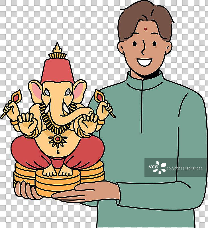 印度男子抱着象头神雕像微笑图片素材