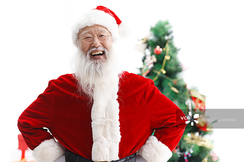 穿着圣诞服的老年男人大笑图片素材
