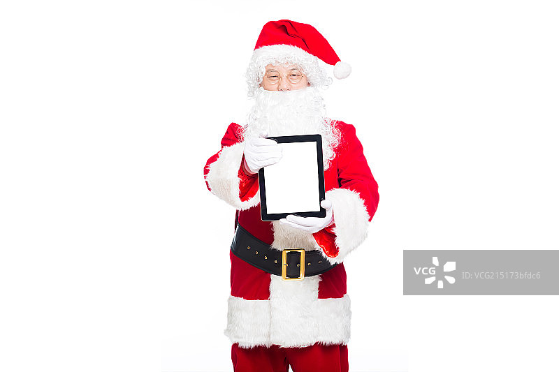 圣诞老人使用平板电脑图片素材