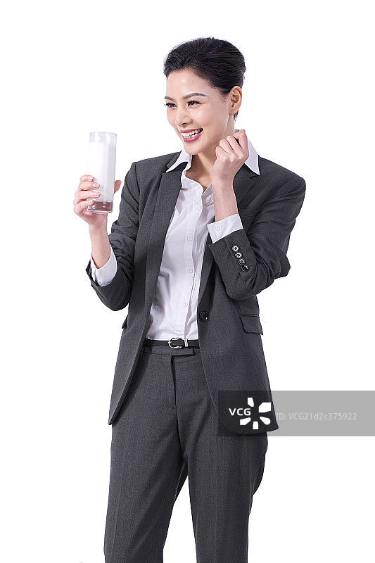 青年商务女士喝牛奶图片素材