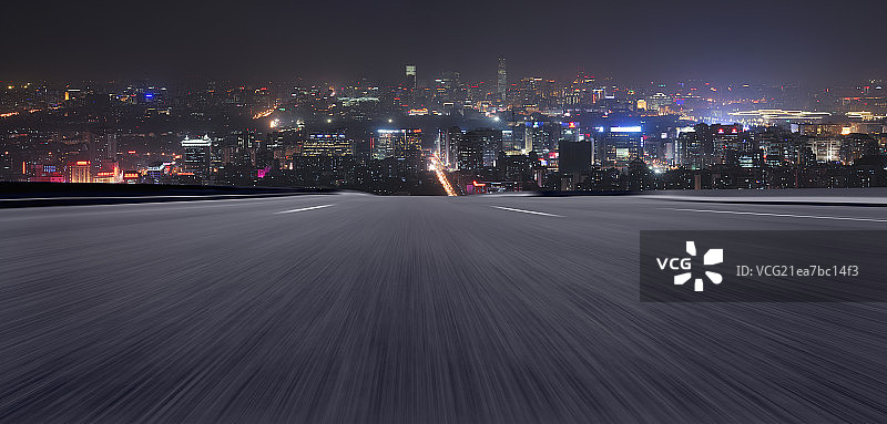北京CBD城市全景夜景和汽车道路运动模糊速度特效图片素材
