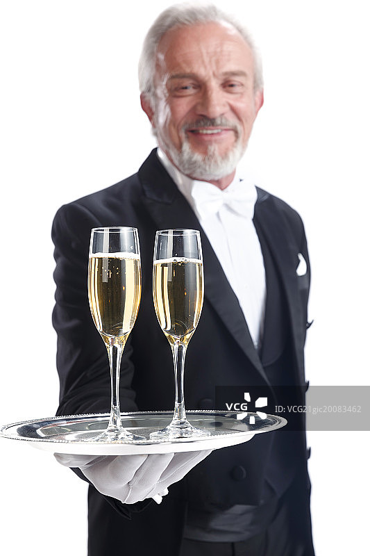 一个男侍者托着香槟图片素材