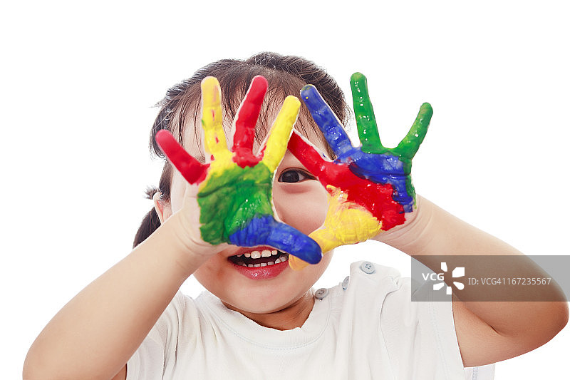 好奇的孩子从五颜六色的手里看着图片素材
