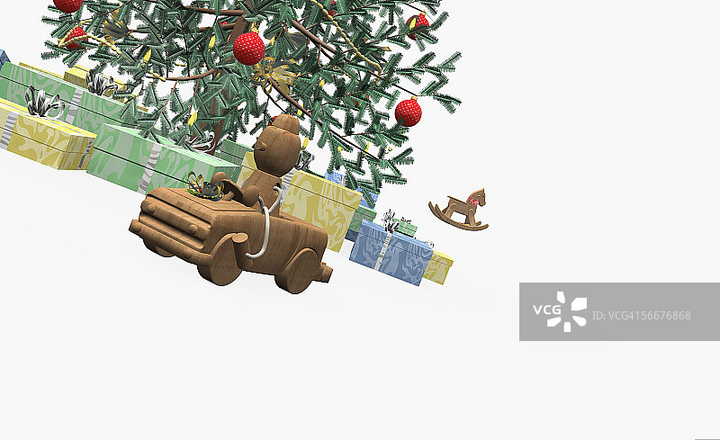 一辆玩具车停在圣诞树前图片素材