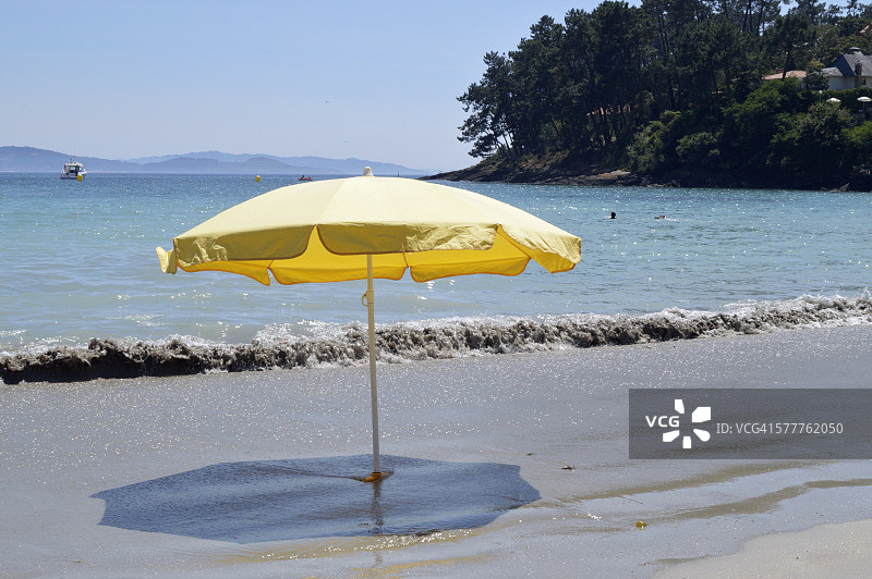 Sanxenxo(加利西亚-西班牙)Silgar海滩上的雨伞图片素材