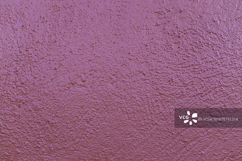 粉红色抹灰锈迹斑斑的混凝土墙图片素材