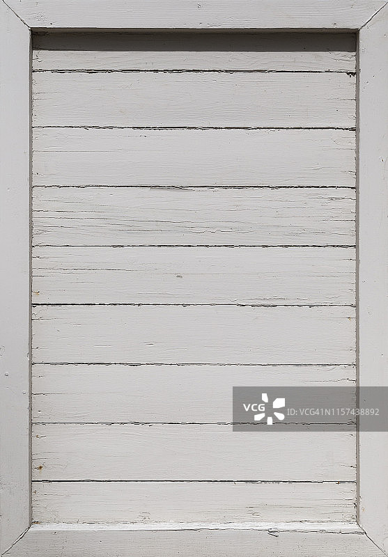 一个白色的旧木板墙的特写图片素材