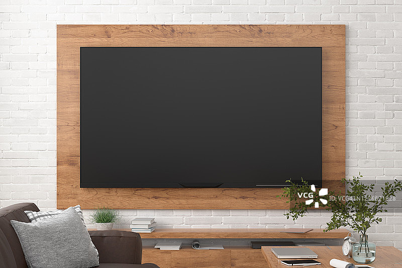 电视屏幕上的墙壁与木板上方的橱柜在现代客厅图片素材