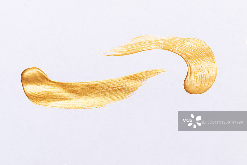 美丽的纹理金色的笔触孤立在白色的背景。图片素材