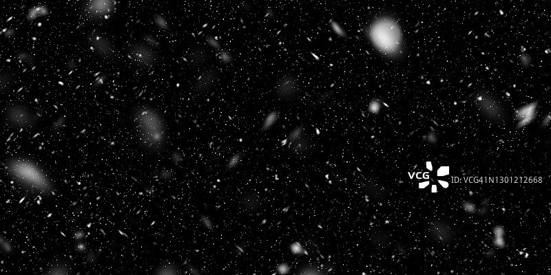 雪花落在黑色的背景上图片素材