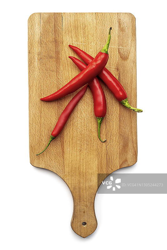 用木砧板切上完美的红辣椒图片素材