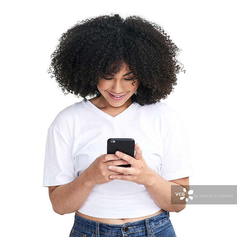 一个漂亮的年轻女子用智能手机拍摄的白色背景图片素材