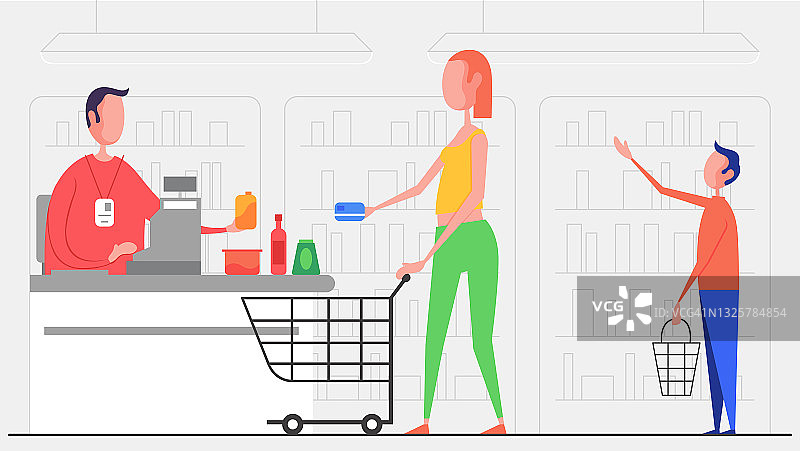 超市收银员-女性顾客用非接触式信用卡付款图片素材