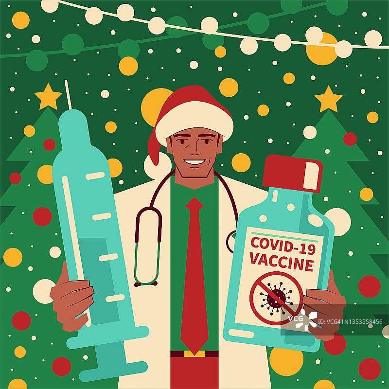 快乐英俊成熟的医生穿着圣诞老人的衣服，拿着疫苗瓶和注射器对抗冠状病毒(COVID-19，流感病毒)图片素材