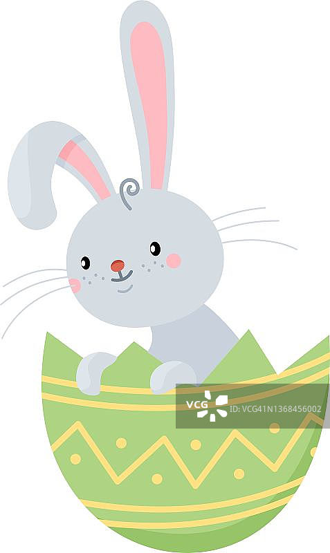 复活节兔子坐在蛋里。图片素材