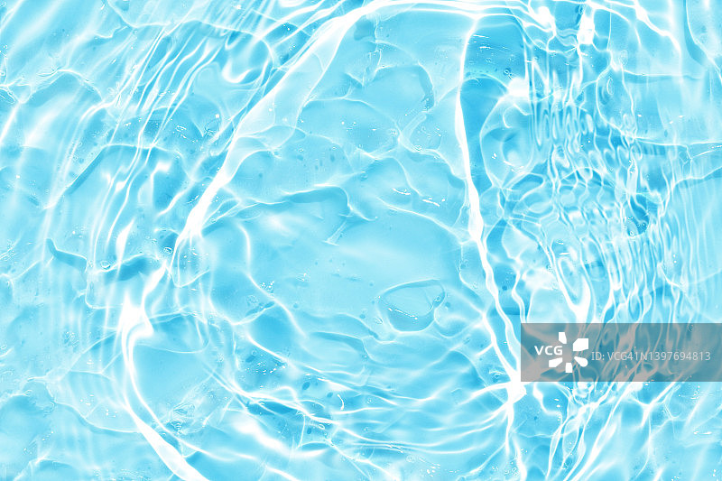 蓝色水波抽象，自然波纹和泡沫纹理，凝胶皂，背景摄影图片素材