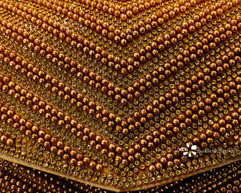 亚克力材料的复杂青铜珠饰图片素材