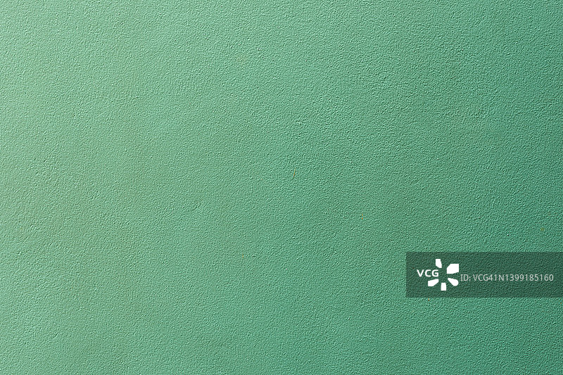 绿色与旧垃圾墙混凝土纹理作为背景。图片素材