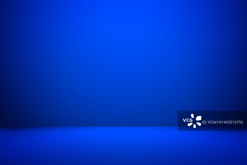 抽象的蓝色背景。空的蓝色渐变室工作室背景。抽象背景，蓝色房间工作室背景图片素材