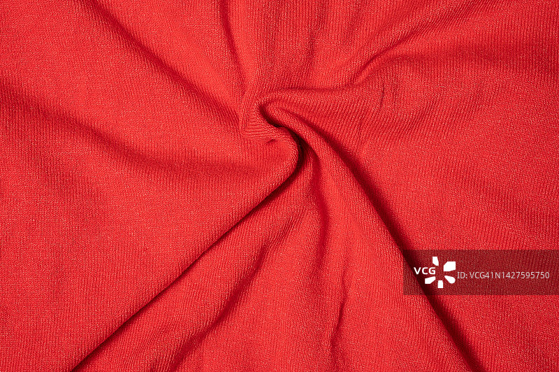 红色面料面料涤纶面料质地和纺织背景。图片素材