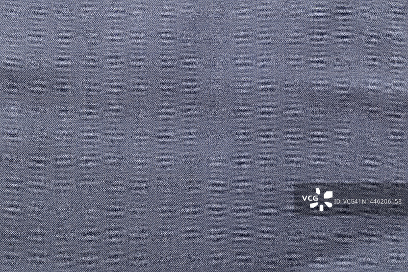 深灰蓝色面料面料涤纶面料质地和纺织背景。图片素材