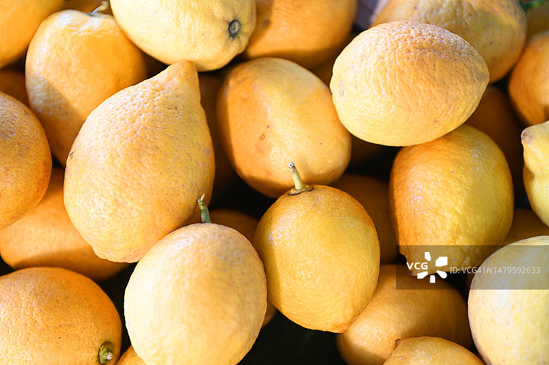 成熟多汁的柠檬为背景图片素材