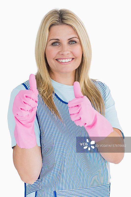 清洁工戴着粉色手套竖起大拇指图片素材