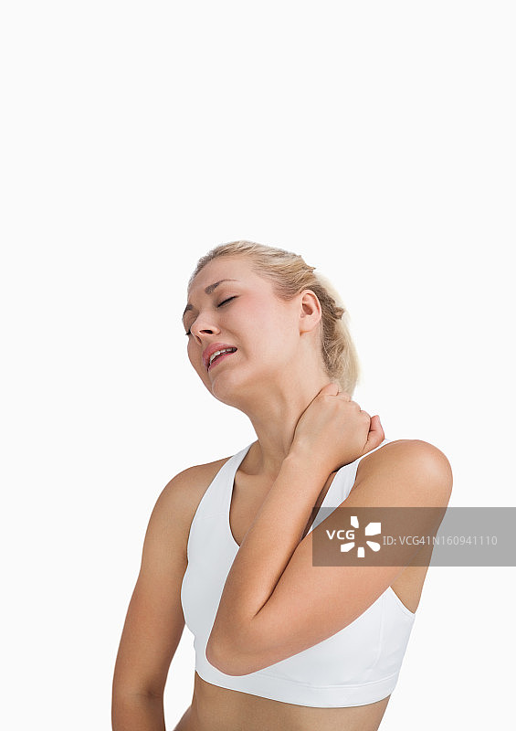年轻女子颈部剧烈疼痛图片素材