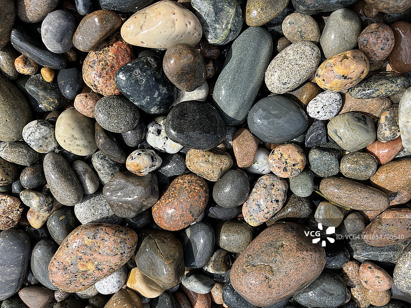海滩上光滑岩石的特写。海鸭角，比尔岛。图片素材