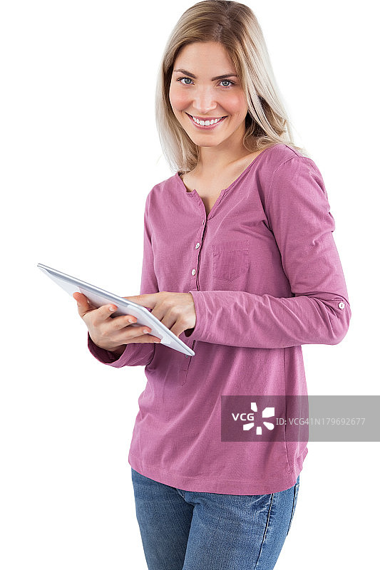用平板电脑的快乐女人图片素材