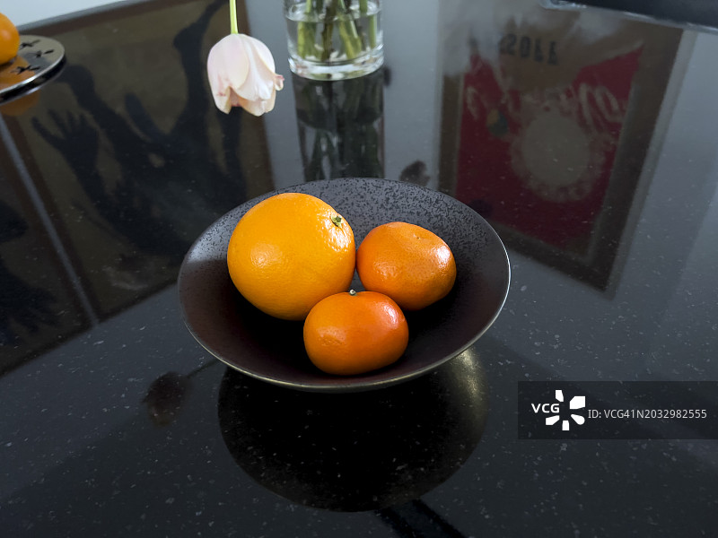 桔子和橘子在碗里的特写图片素材