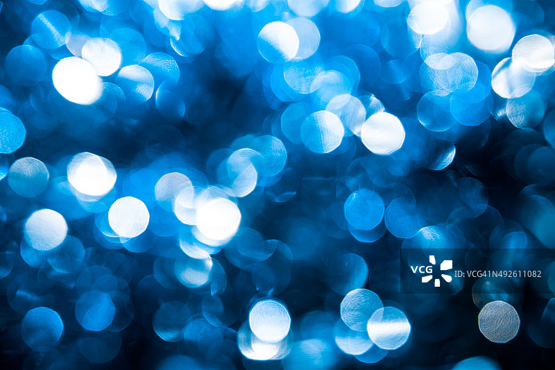 抽象的蓝色圣诞灯作为背景图片素材