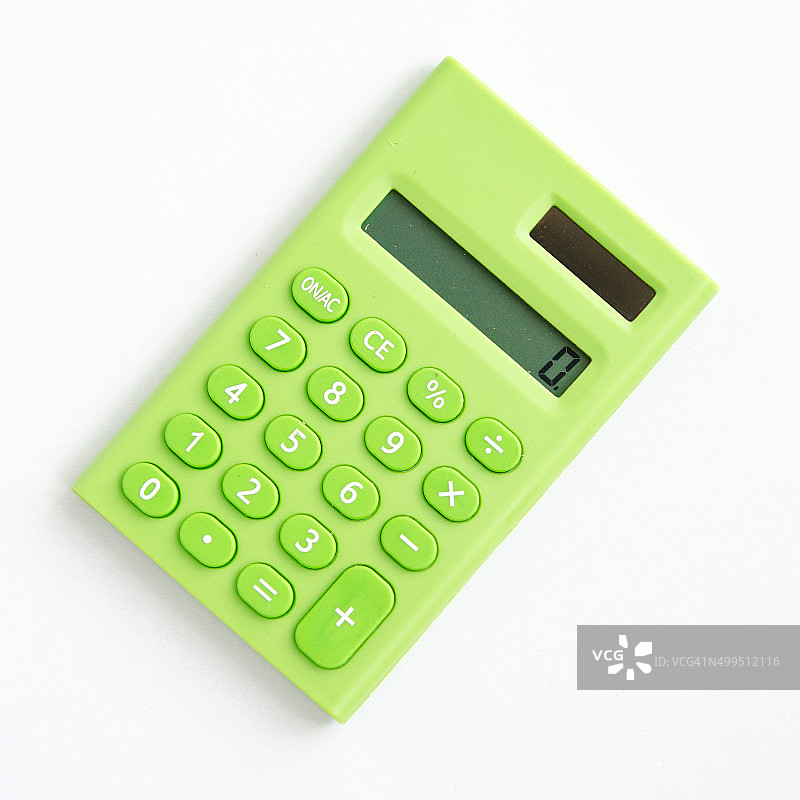 绿色可爱的计算器在白色的背景图片素材