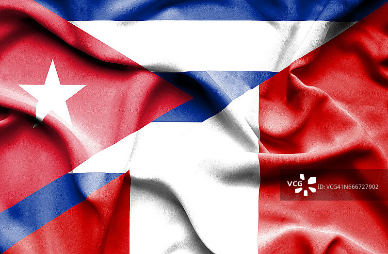 挥舞着秘鲁和古巴的旗帜图片素材