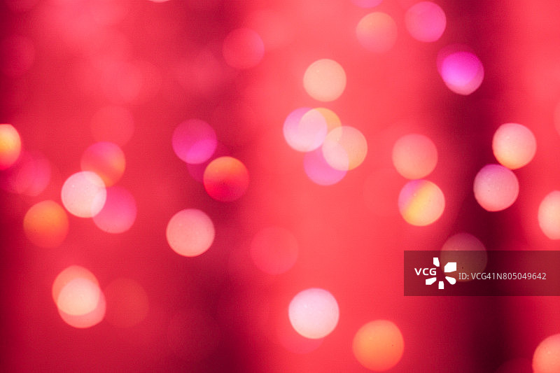 大胆的红色散焦圣诞灯散焦窗帘图片素材