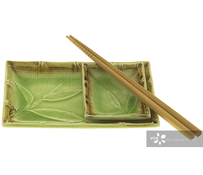 绿色陶瓷餐具旁的筷子图片素材