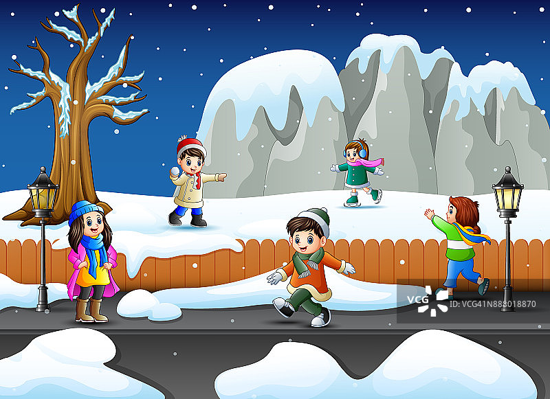 卡通的孩子们在下雪的花园里玩耍图片素材