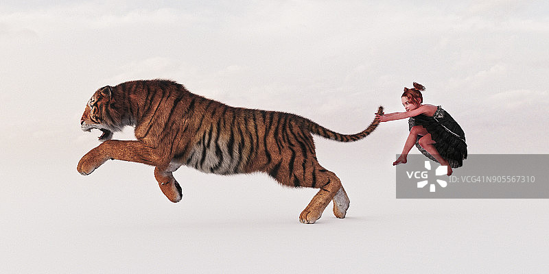 女孩抓着老虎的尾巴图片素材