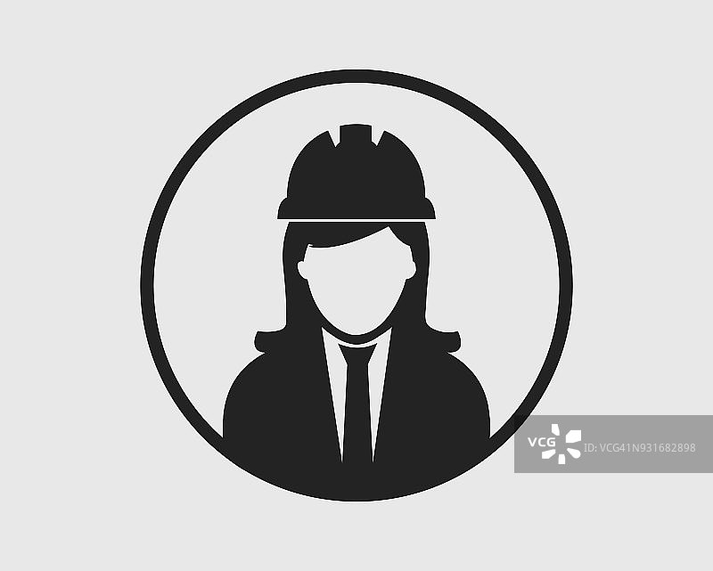 圆形的女工程师图标。妇女象征着头戴头盔。图片素材